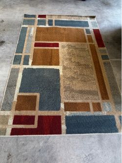 Multi-color 5x7 area rug. Mohawk brand.