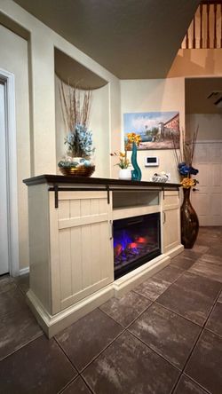 Beautiful white farmhouse fireplace/tv stand with 5 colors of flames in excellent condition