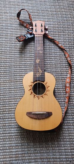 Used Ukulele (Missing One String)