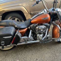 2000  Road king Low mileas great shape  extra parts  to make a bagger if you want to purchase with it Road king