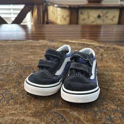 Blue and black toddler vans