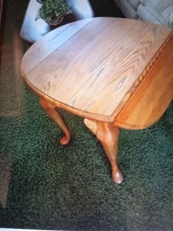 Coffee table and 2 end tables.The inn tables dropped down on the sides , or you can put them up to be round very good shape