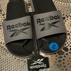 Child’s Reeboks Slip Ons