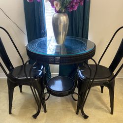 Small Black Wrought Iron And Wicker Dining Table And 2 Chairs In Excellent Condition