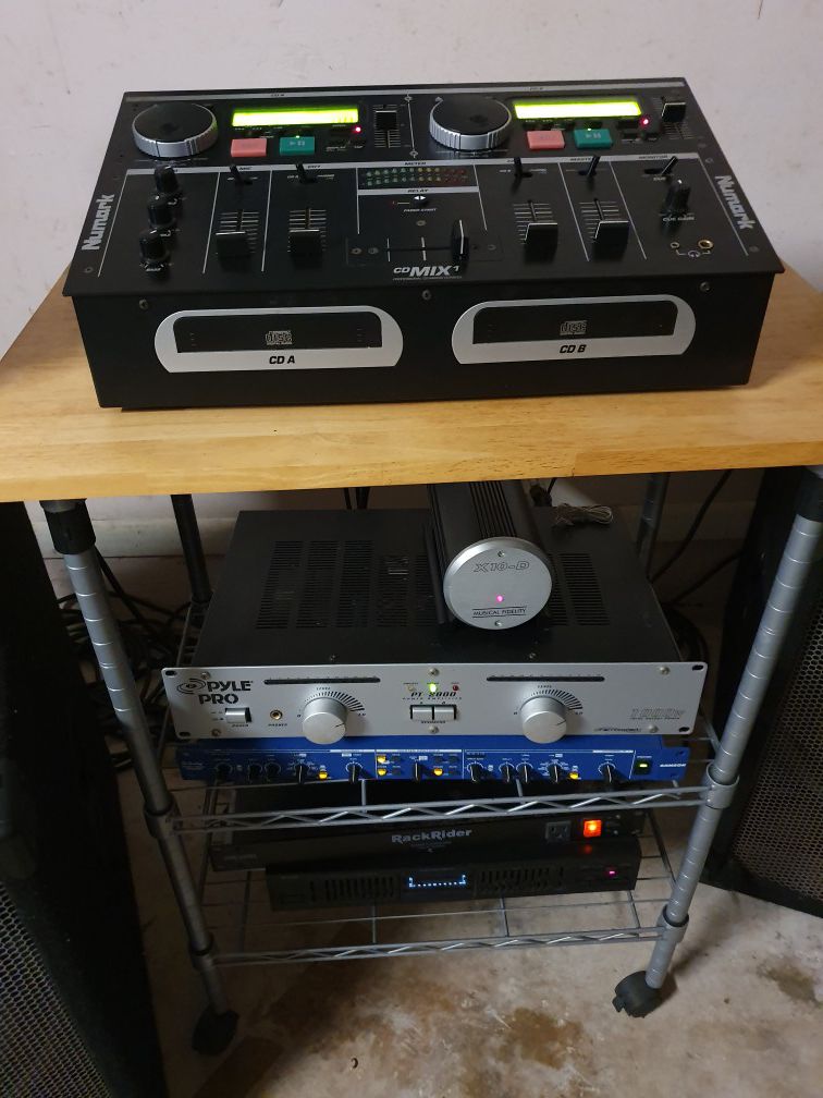 DJ speaker system. EV & Peavey speakers. Numark CD- mixer. Music Fidelity tube amp. Lots more!