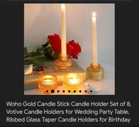 Versatilew gold ribbed glass candle holders. Set of 8 holders, can be used for taper candles or votive candles. Great for wedding party table or birth