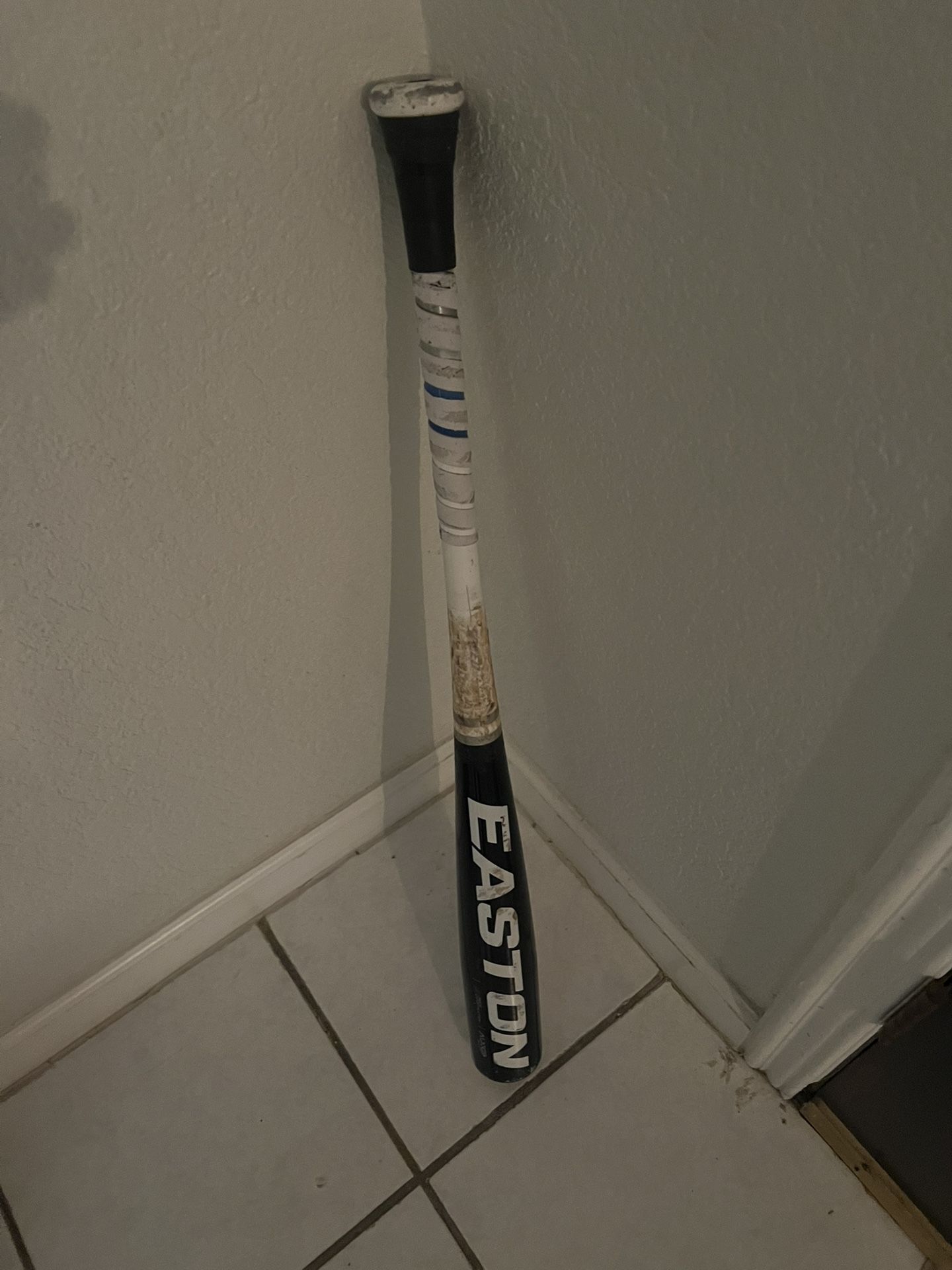 Baseball Gloves And Bats