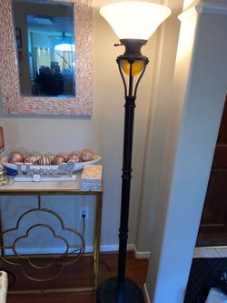 Traditional / Victorian Revival with an elegant fluted pillar design.