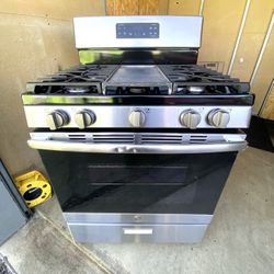 GE gas stove 5 burners stainless st with griddle.  30”
