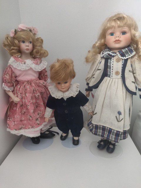 Three Beautiful Collectable Porcelain Dolls