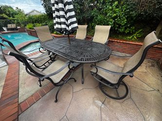 Patio cast aluminum chairs and barstools