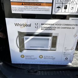 1.7 cu. ft. Microwave Hood Combination with Electronic Touch Controls - New In Box