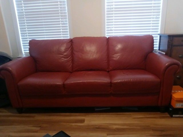 Red/Orange Leather Couch 400.00 OBO