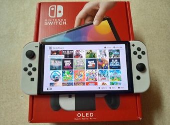 Nintendo Switch OLED + 100 Switch Games and 7000 Classic Games
