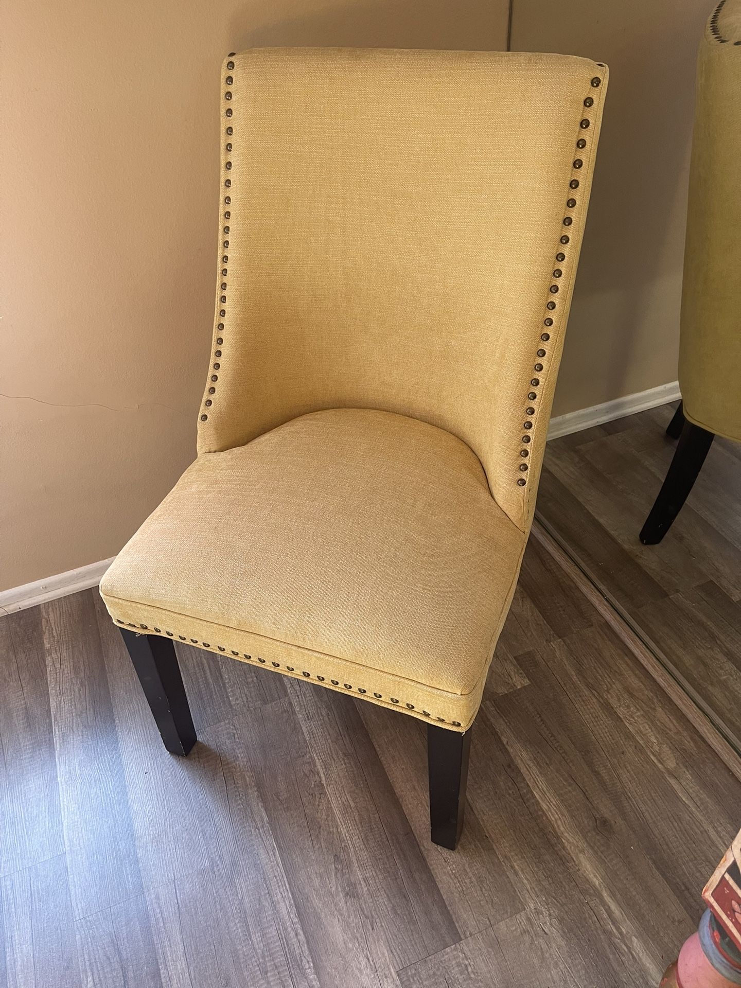 Beautiful Light Yellow Fabric Chair With Nail Head Accents