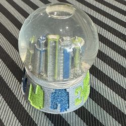 Globe with city inside 