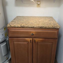 FREE: Kitchen cabinet with granite top