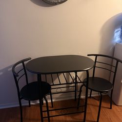 Table with 2  chairs