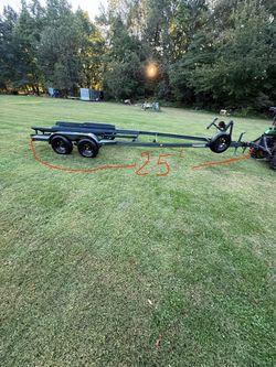 Dual axle boat trailer.