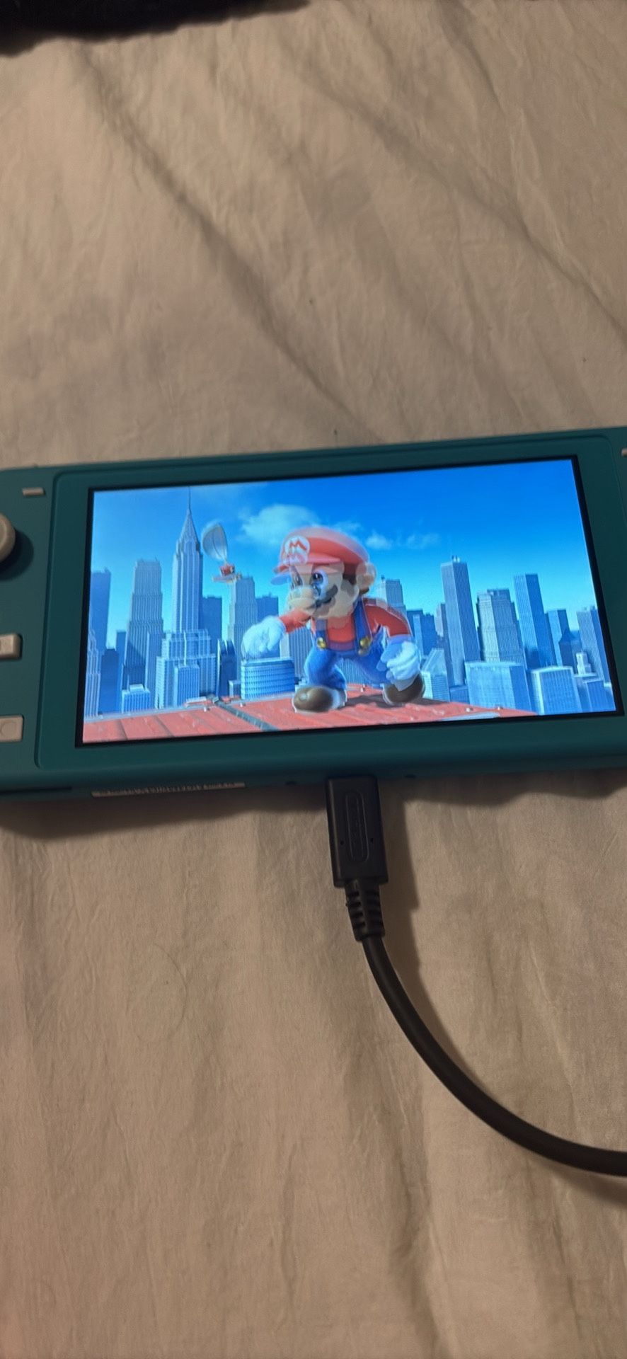 🎮 Nintendo Switch Lite + Super Smash Bros. Ultimate – $160