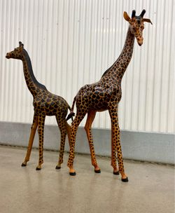 Vintage 1970’s genuine leather wrapped large giraffe sculptures (set of 2)