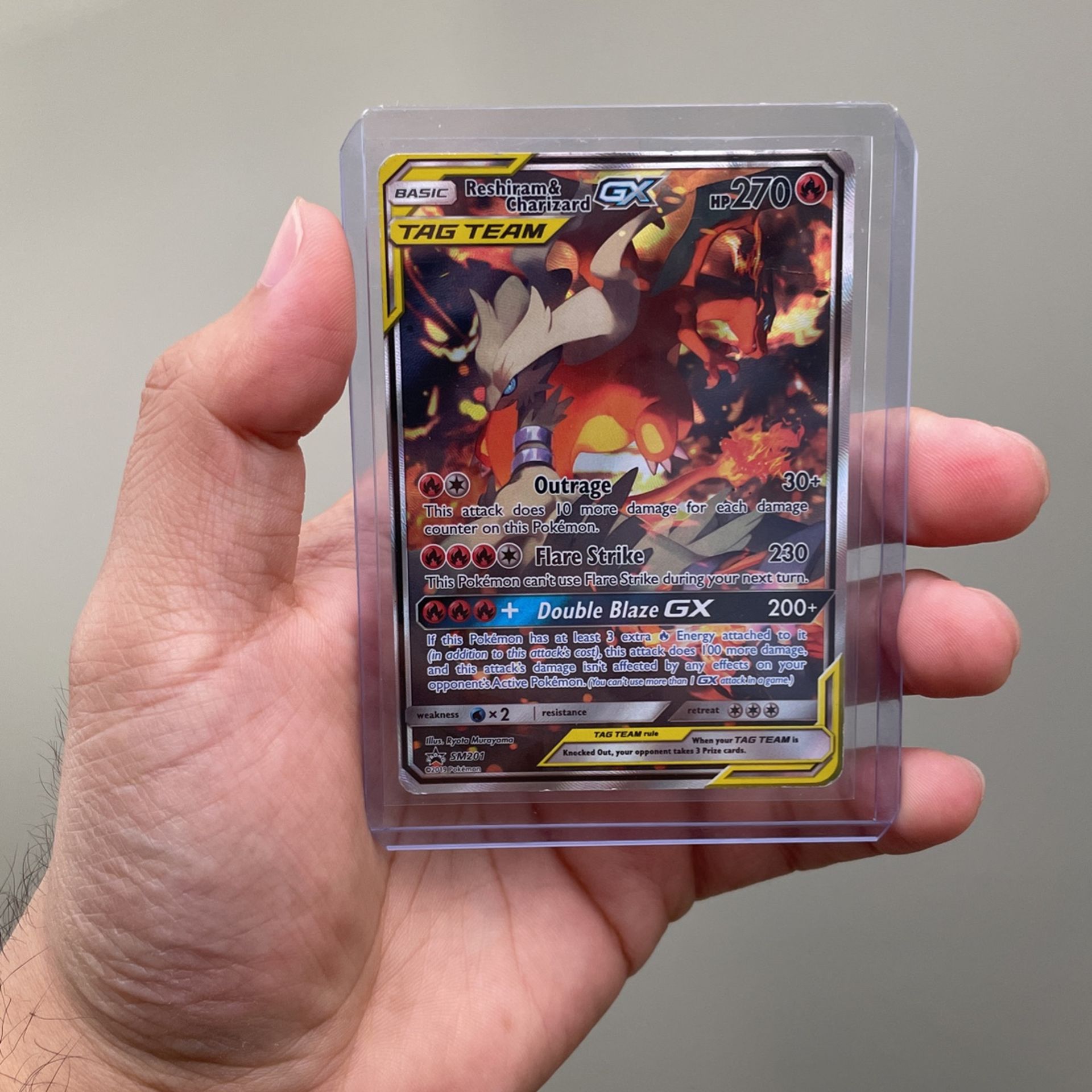 Why I think the reshiram and charizard gx tag promo psa 10 is