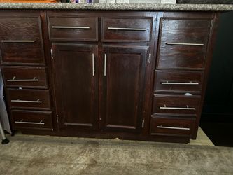 Dark Wood Kitchen Island with Granite Top with seating area