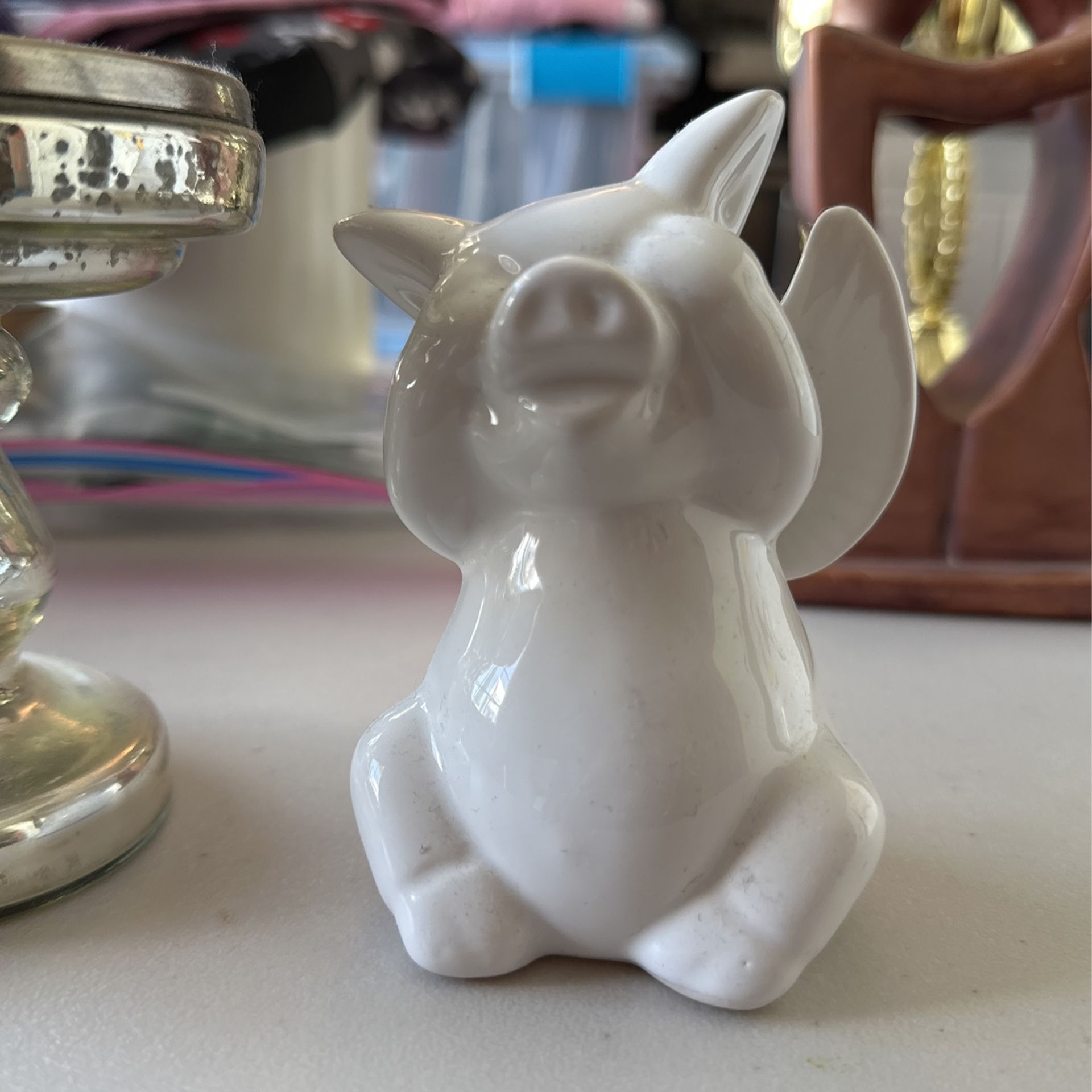 Candle Holder And Wing Pig Sculpture $1.00