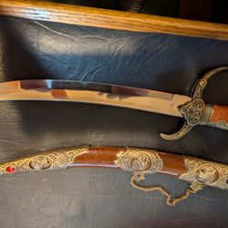 10.5 inch  dagger with sheath.