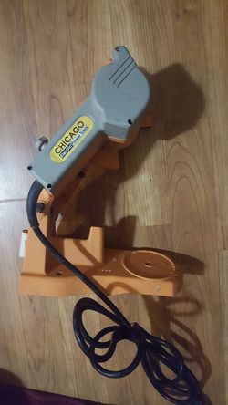 Chain saw blade sharpener