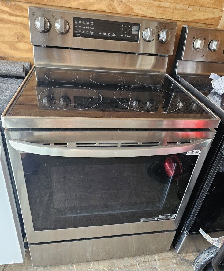 LG STAINLESS STEEL GLASSTOP STOVE CONVECTION OVEN.....$ 400