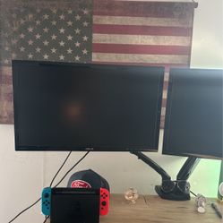 Two Computer Monitors With Stand