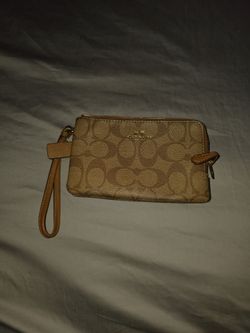 Brown coach wristlet