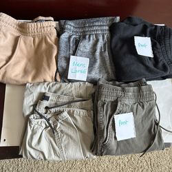 Men’s shirts pants - small , large used each $3