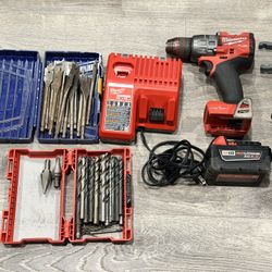 Milwaukee M18 Fuel One key Hammer Drill With A lot Of Drill Bits Plus 5.0 Battery And Charger $150