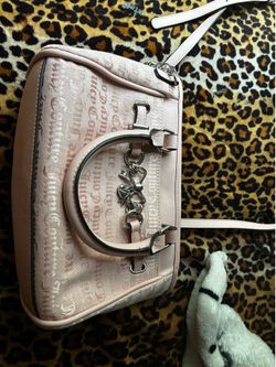 Juicy Couture Juicy Darling Satchel, specifically in the Pink Diamond colorway.