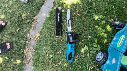 Brand New Makita Electric Chainsaw
