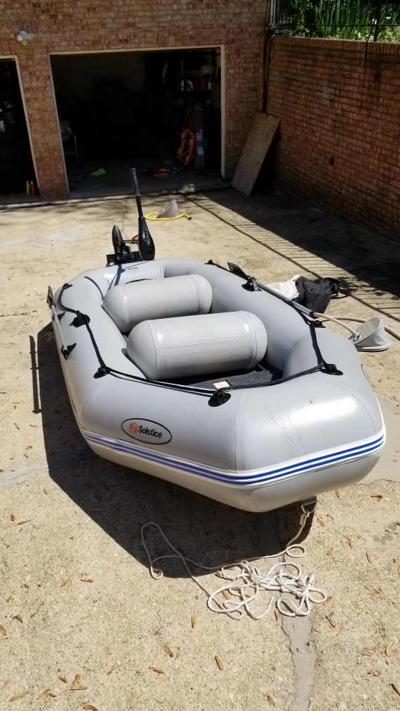 Inflatable boat with motor and floor