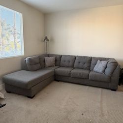 Dark gray sectional couch