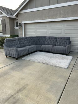 Grey Tufted Modular Reclining Sectional (Delivery Available)