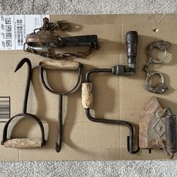 Vintage Lot. 7 Lb Iron, Hand Drill, 2 Bale Hooks, Vermin Trap, And Vintage Toy Handcuffs