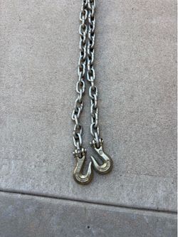 Tow chains, hitch ball, floor jack, dolly, drill