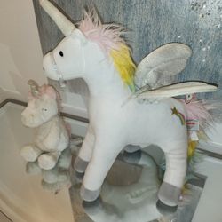 Unicorn musical plush dolls
