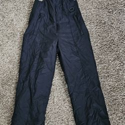 Unisex Sport Essentials Snow Pants Sz 14 Black Zip Up Buckle Straps youth child overall 

Excellent Pre-owned condition,  used a few times
Size 14 you