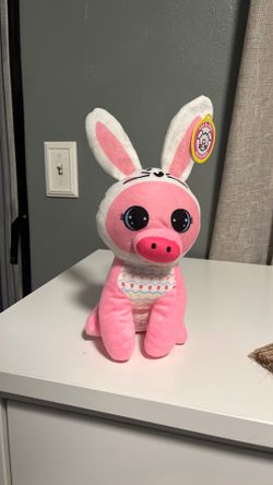 Pig in a bunny costume