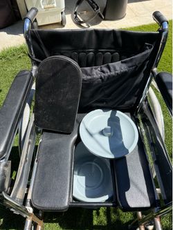 Wheelchair with built in toilet