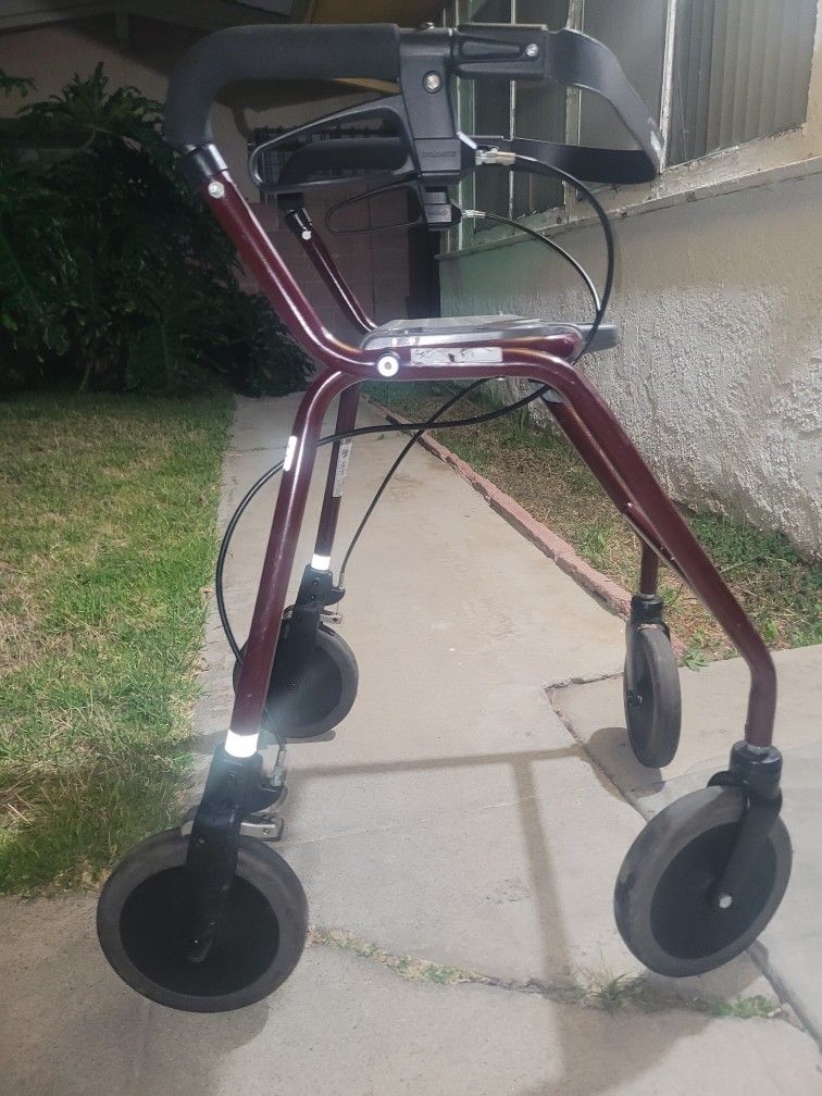 Dolomite Legacy Rollator walker, which is a mobility aid designed for both indoor and outdoor use. 
Key features and information about this rollator i