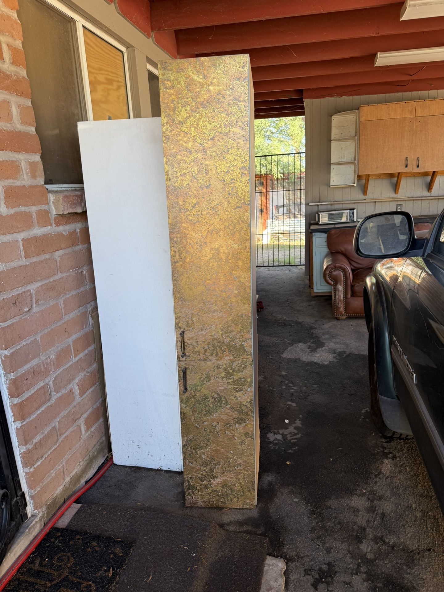 Tall cabinet with slide out drawers