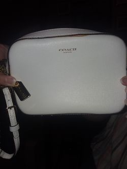Coach white wristlet convertible pouchlet..New