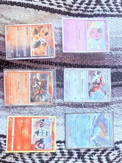 45 different Holo Pokemon cards 3 non holos